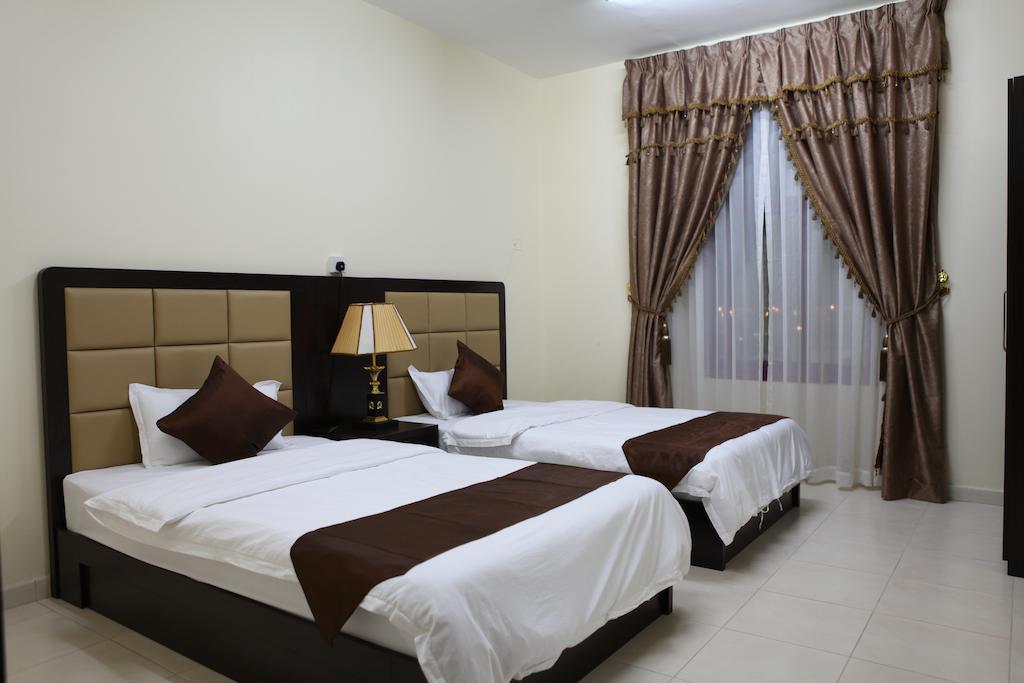 Oasis Residence Fuyaira Habitación foto